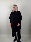 Lang sleeveless vest model Rebecca Zwart